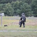 Demonstrating how to use water to disable a simulated suspicious device