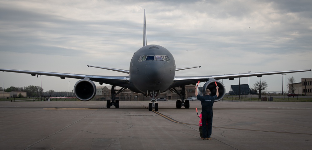 U.S. Air Force Maj. Kyle Haydel celebrates his final flight