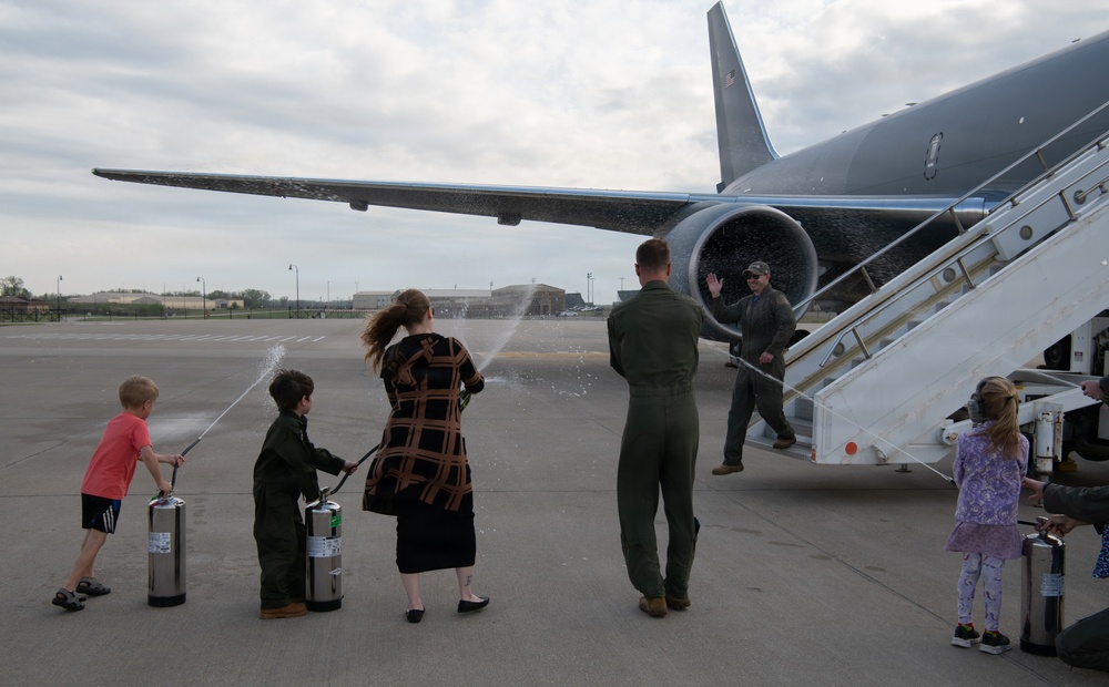 U.S. Air Force Maj. Kyle Haydel celebrates his final flight