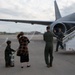 U.S. Air Force Maj. Kyle Haydel celebrates his final flight