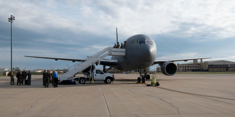 U.S. Air Force Maj. Kyle Haydel celebrates his final flight