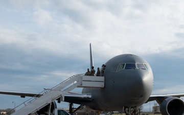 U.S. Air Force Maj. Kyle Haydel celebrates his final flight