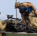 U.S. Navy EODMU 8 member load the Manned Transport Robot System (MTRS) during Seabreeze26
