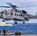 Canadian and New Zealand sailors conduct vertical replenishment training during RIMPAC 2026