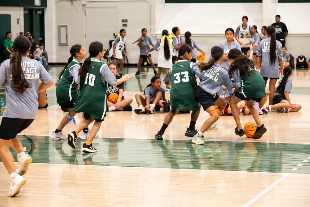 94th Army Air and Missile Defense Command Soldiers lend a hand during the Youth Impact program finale