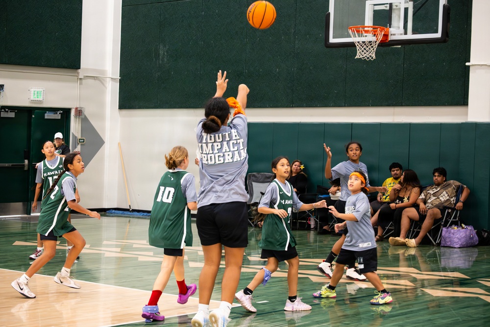 94th Army Air and Missile Defense Command Soldiers lend a hand during the Youth Impact program finale