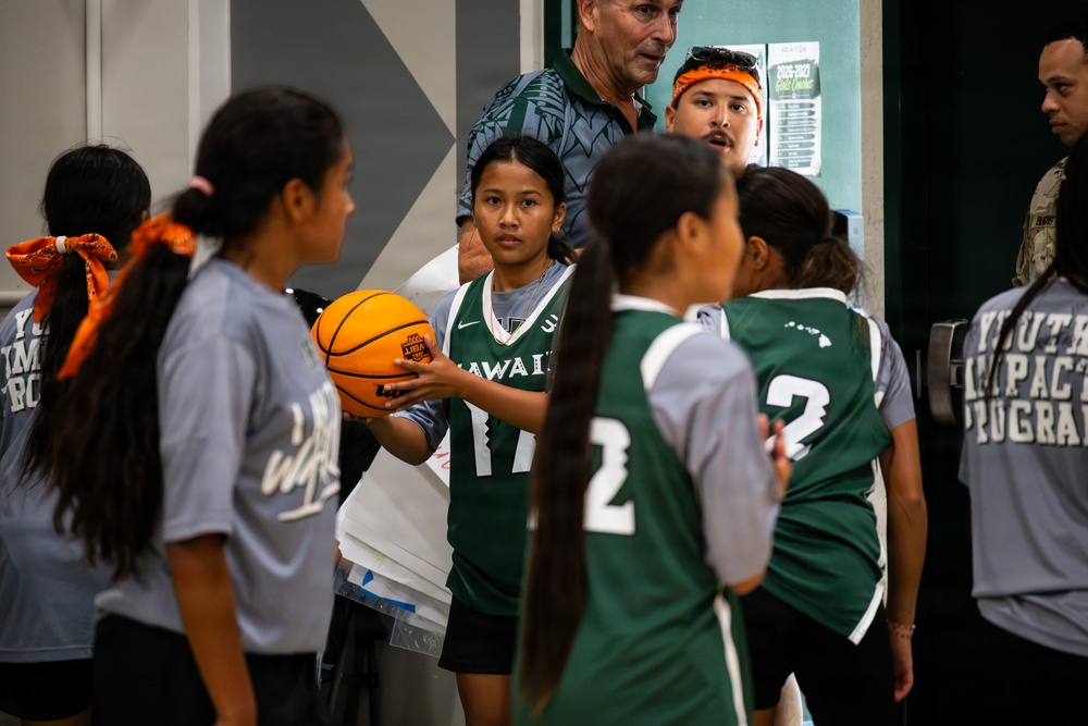 94th Army Air and Missile Defense Command Soldiers lend a hand during the Youth Impact program finale