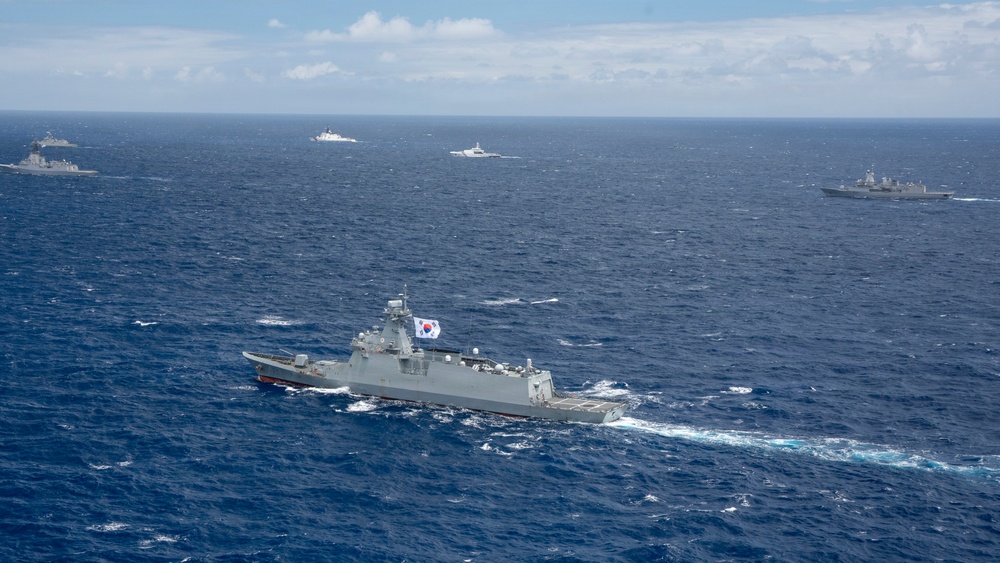 Partner nations participate in group sail lead by the USS Theodore Roosevelt during RIMPAC 26