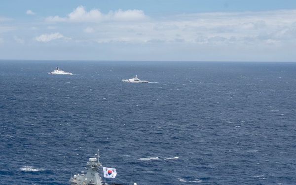 Partner nations participate in group sail lead by the USS Theodore Roosevelt during RIMPAC 26