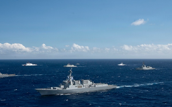 Partner nations participate in group sail lead by the USS Theodore Roosevelt during RIMPAC 26