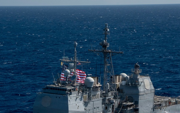 Partner nations participate in group sail lead by the USS Theodore Roosevelt during RIMPAC 26
