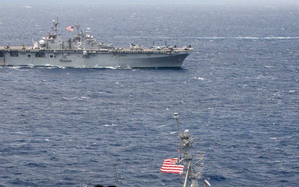 Partner nations participate in group sail lead by the USS Theodore Roosevelt during RIMPAC 26