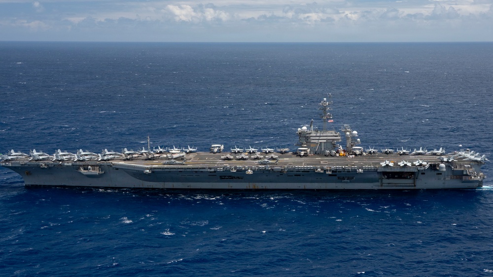 Partner nations participate in group sail lead by the USS Theodore Roosevelt during RIMPAC 26