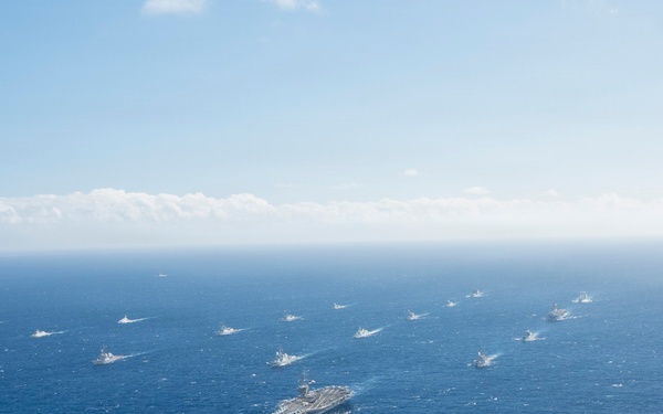 Partner nations participate in group sail lead by the USS Theodore Roosevelt during RIMPAC 26