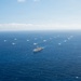Partner nations participate in group sail lead by the USS Theodore Roosevelt during RIMPAC 26