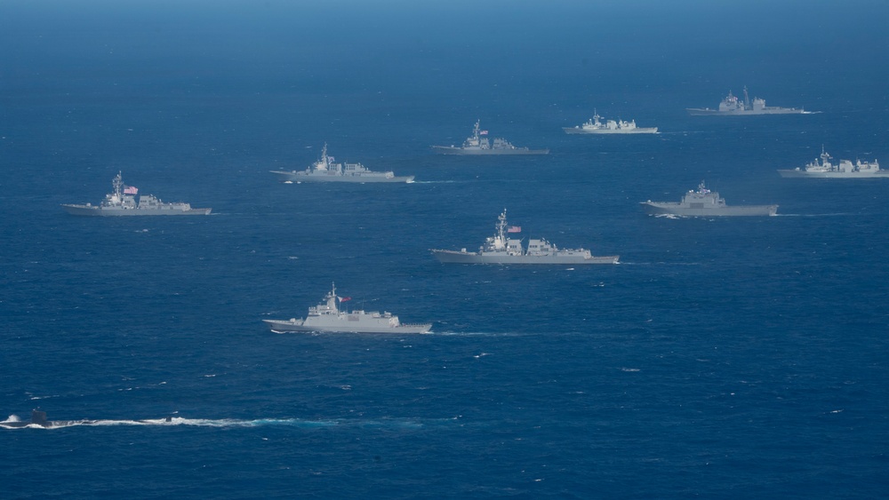 Partner nations participate in group sail lead by the USS Theodore Roosevelt during RIMPAC 26