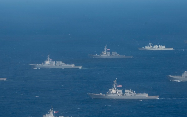 Partner nations participate in group sail lead by the USS Theodore Roosevelt during RIMPAC 26