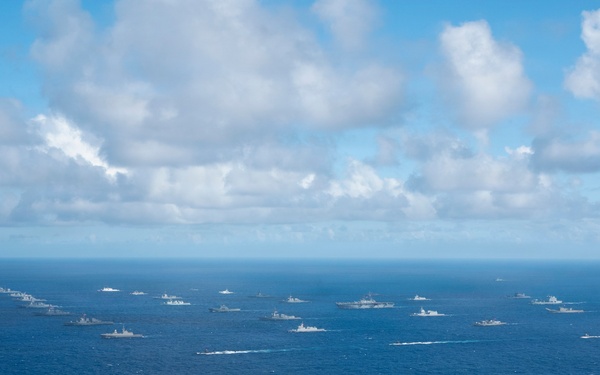 Partner nations participate in group sail lead by the USS Theodore Roosevelt during RIMPAC 26