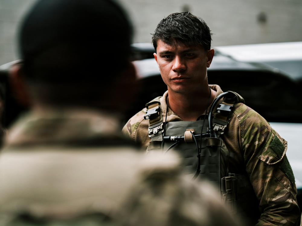 Royal New Zealand Navy EOD technicians participate in dismounted response drill