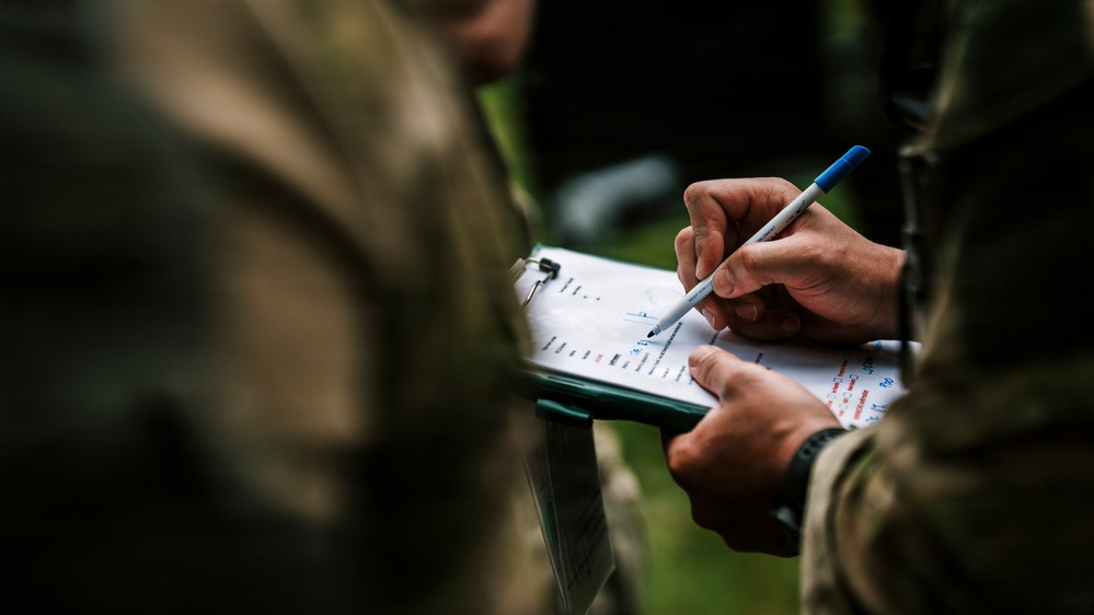 Royal New Zealand Navy EOD technicians participate in dismounted response drill