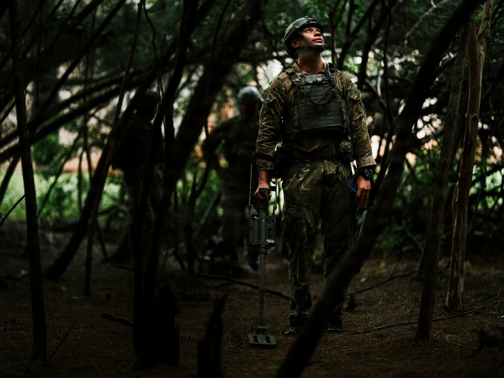 Royal New Zealand Navy EOD technicians participate in dismounted response drill