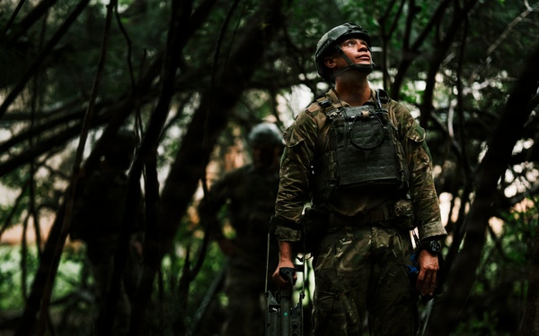 Royal New Zealand Navy EOD technicians participate in dismounted response drill