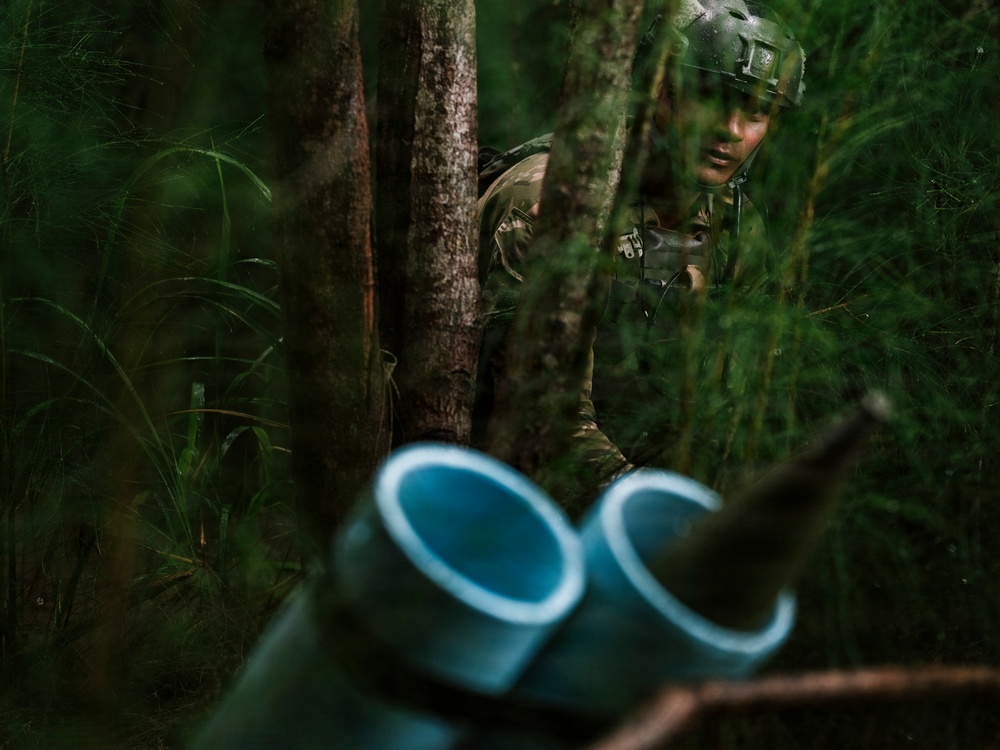 Royal New Zealand Navy EOD technicians participate in a dismounted response drill
