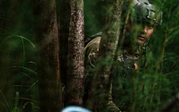 Royal New Zealand Navy EOD technicians participate in a dismounted response drill