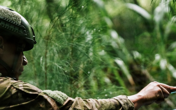 Royal New Zealand Navy EOD technicians participate in dismounted response drill