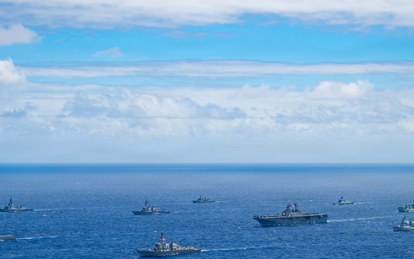 Partner nations participate in group sail lead by the USS Theodore Roosevelt during RIMPAC 26