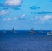 Partner nations participate in group sail lead by the USS Theodore Roosevelt during RIMPAC 26
