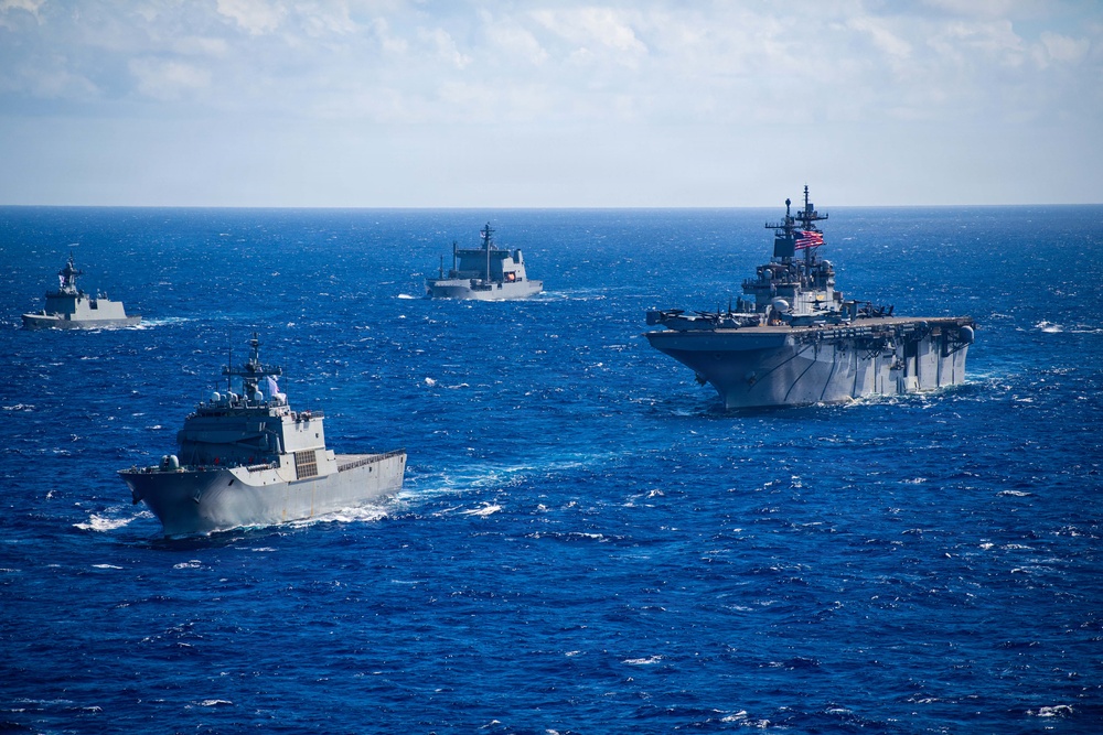Partner nations participate in group sail lead by the USS Theodore Roosevelt during RIMPAC 26