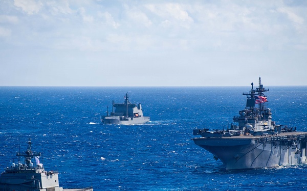 Partner nations participate in group sail lead by the USS Theodore Roosevelt during RIMPAC 26
