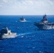 Partner nations participate in group sail lead by the USS Theodore Roosevelt during RIMPAC 26