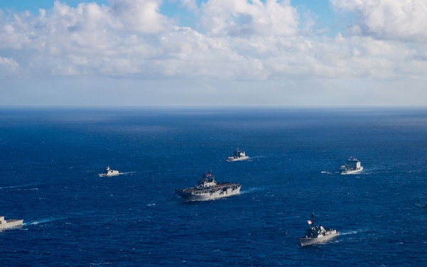Partner nations participate in group sail lead by the USS Theodore Roosevelt during RIMPAC 26
