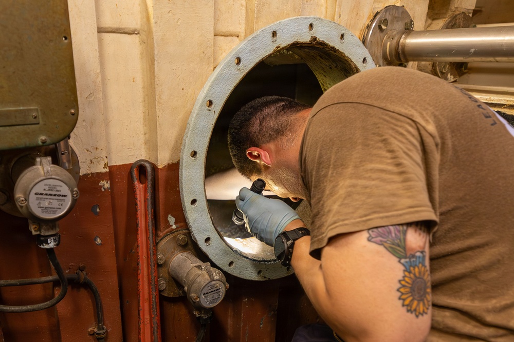 Engineers aboard USS Gonzalez
