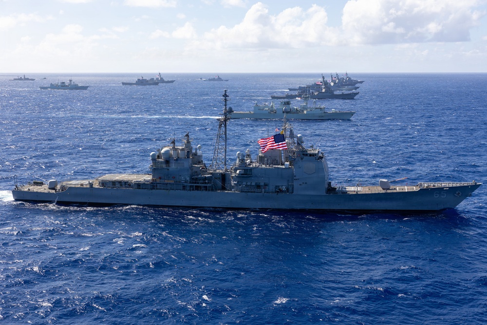 Multinational ships sail in formation during RIMPAC 2026
