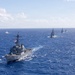 Multinational ships sail in formation during RIMPAC 2026