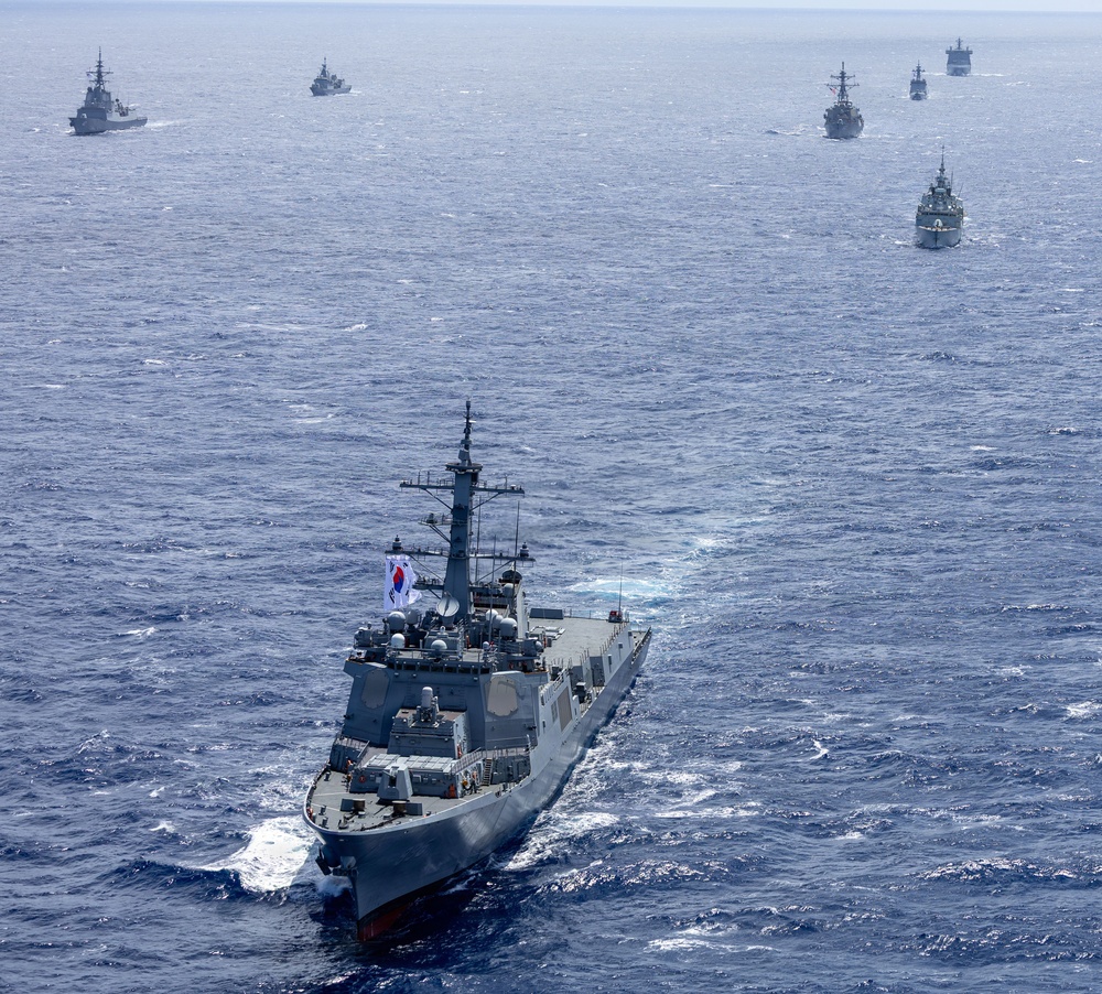 Multinational ships sail in formation during RIMPAC 2026