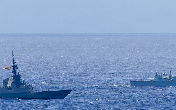 Multinational ships sail in formation during RIMPAC 2026