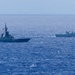 Multinational ships sail in formation during RIMPAC 2026