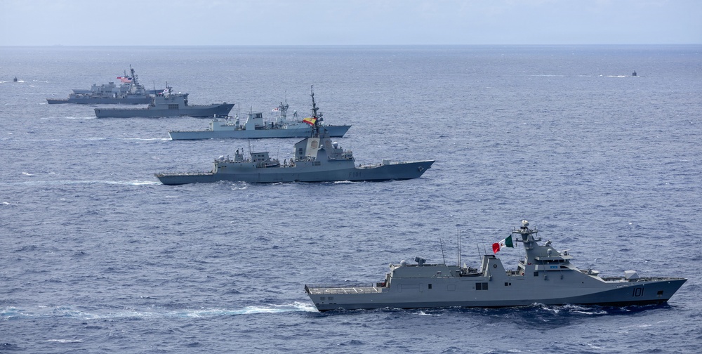 Multinational ships sail in formation during RIMPAC 2026