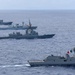 Multinational ships sail in formation during RIMPAC 2026