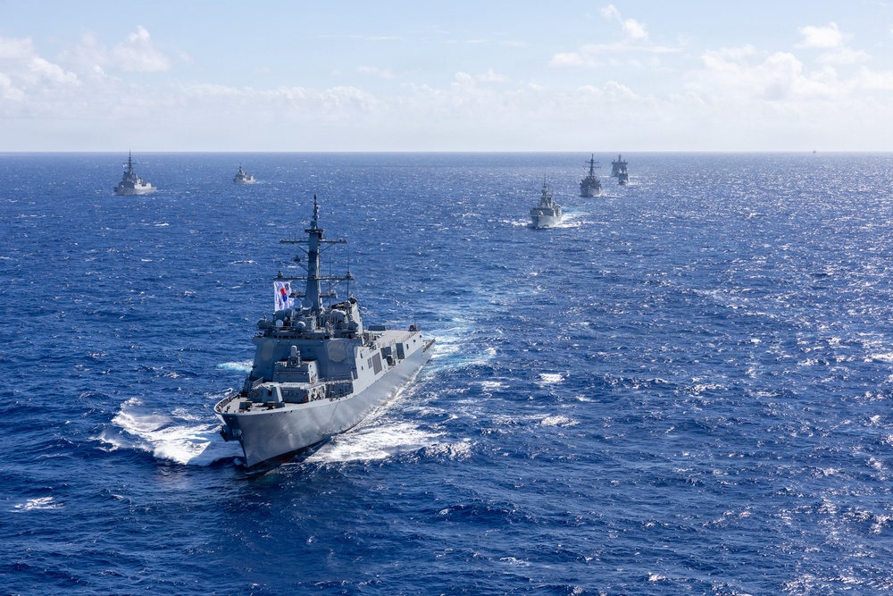Multinational ships sail in formation during RIMPAC 2026