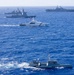 Multinational ships sail in formation during RIMPAC 2026
