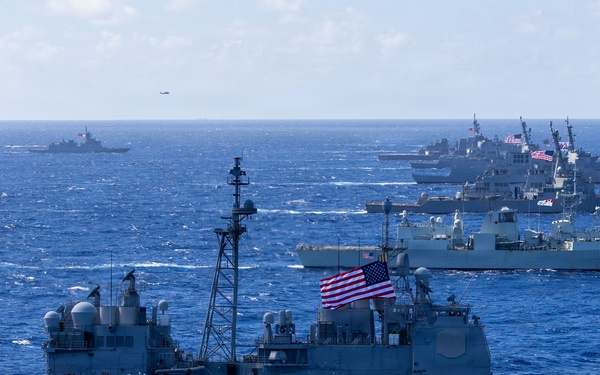 Multinational ships sail in formation during RIMPAC 2026