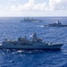 Multinational ships sail in formation during RIMPAC 2026