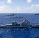 Multinational ships sail in formation during RIMPAC 2026