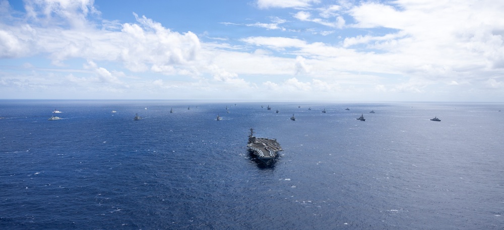 Multinational ships sail in formation during RIMPAC 2026