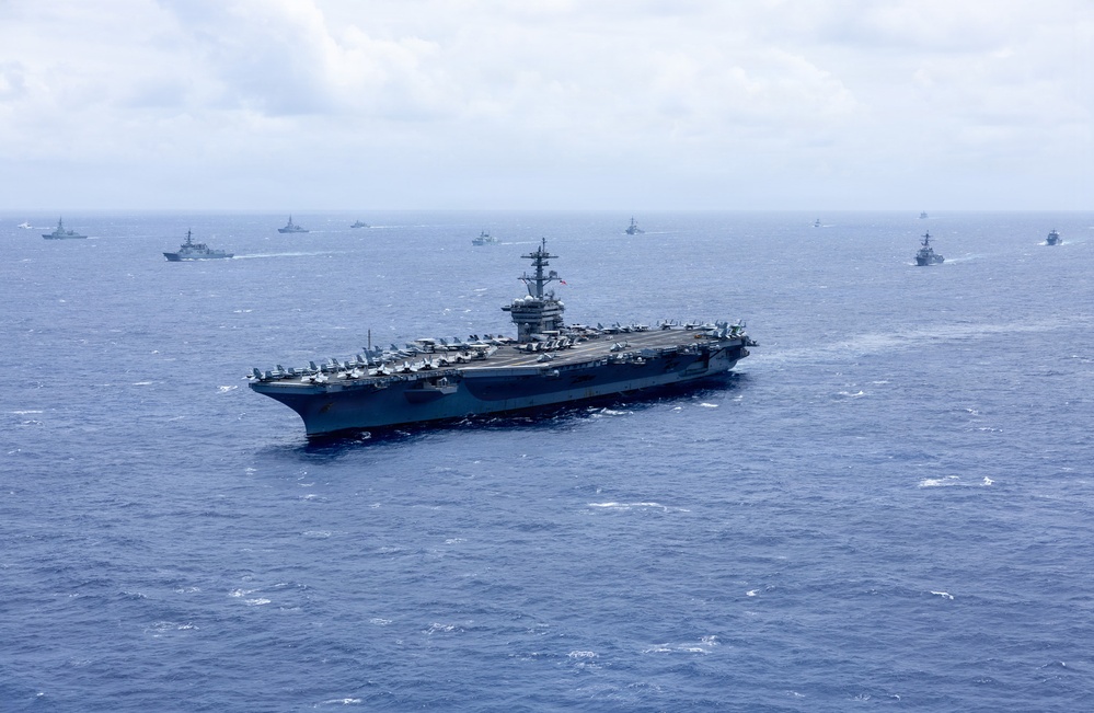 Multinational ships sail in formation during RIMPAC 2026